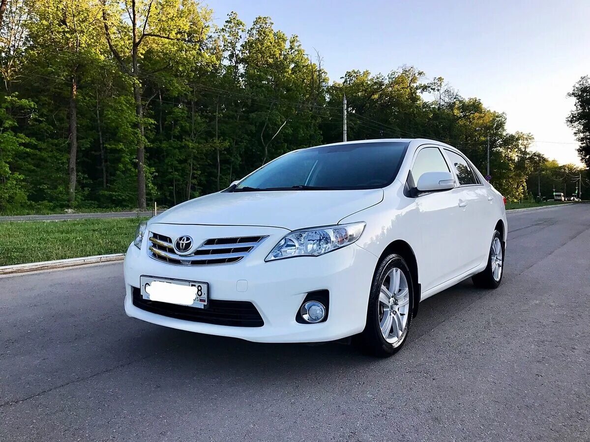 Купить короллу 2012 года. Toyota Corolla e150. Toyota Corolla 2012. Toyota Corolla 2012 белая. Toyota Королла 2012.