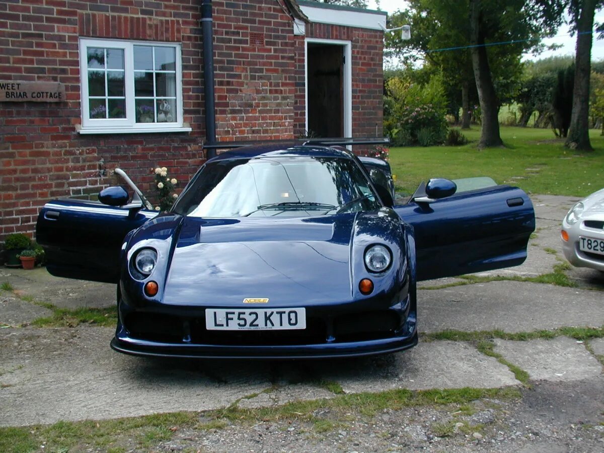 М 12. Noble m12. Машина Noble m12. Noble m12 GTO Interior. Noble марка машины.