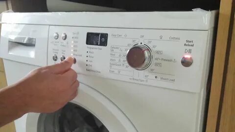 Как открыть машинку во время стирки