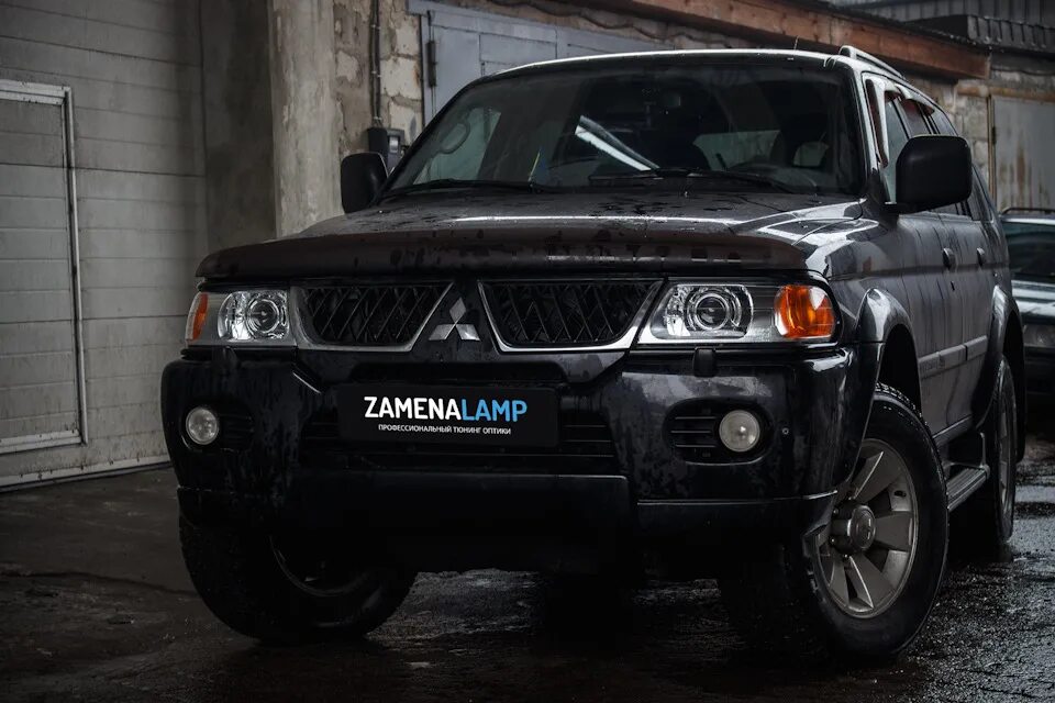 Pajero sport 2006. Линзы Mitsubishi Pajero Sport 1. Оптика на Митсубиси Паджеро спорт 1. Фара Митсубиси Паджеро спорт 1. Новая оптика Mitsubishi Pajero Sport 1.