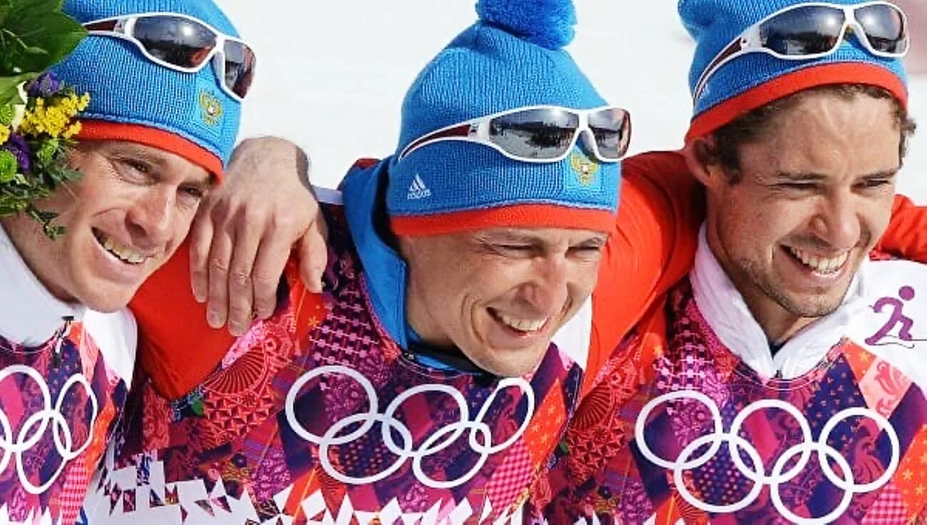 Большунов в костюме с медалями. Лыжники чемпионы. Олимпийские чемпионы по лыжам. Олимпийские чемпионы по лыжам. Олимпийские чемпионы по лыжам.