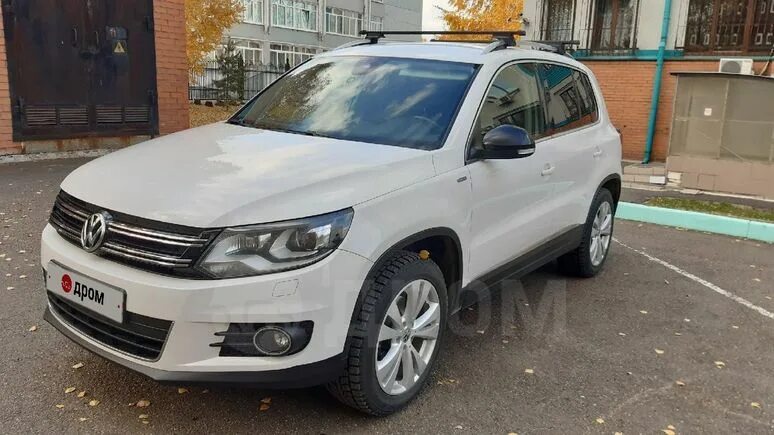 Tiguan 2013. Фольксваген тигуан 2014 салон. Фольксваген тигуан i рестайлинг 2. Фольксваген тигуан 2013 размеры. Фольксваген тигуан 12 года.