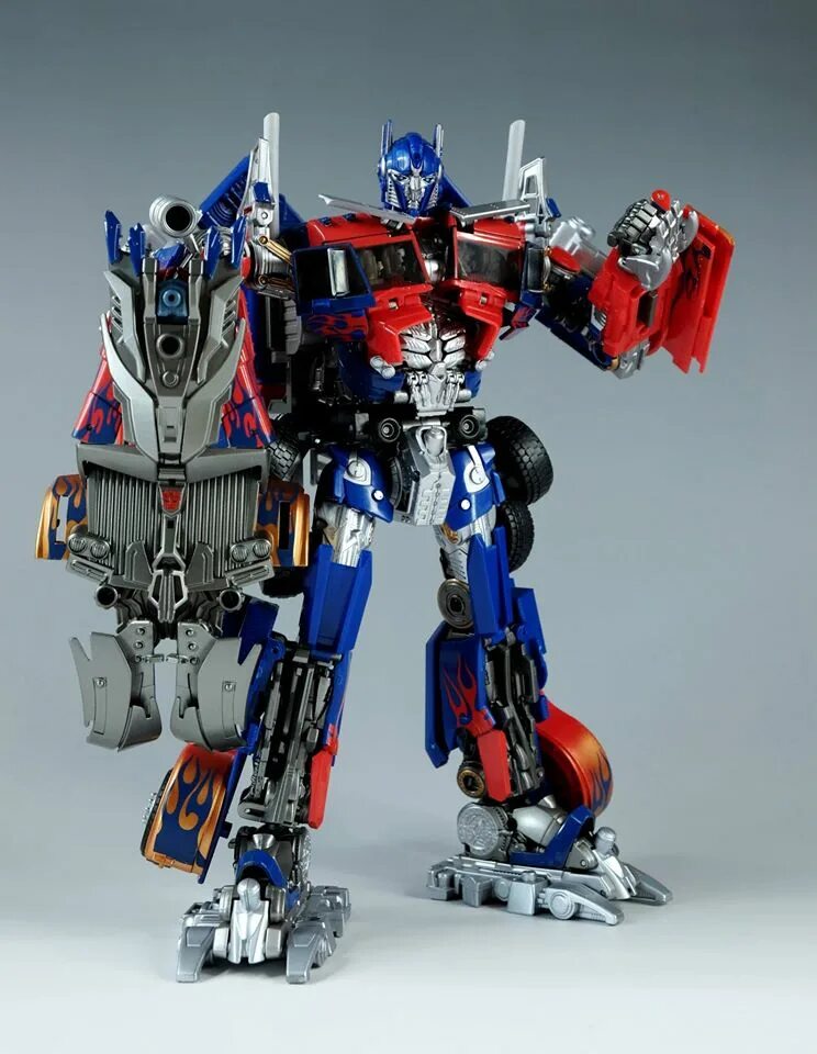 Под оптимус прайм. Optimus Prime APS 01u. Takara Tomy трансформеры Оптимус. Transformer Prime Takara Voyager Optimus Prime. Transformers DOTM Optimus Prime.