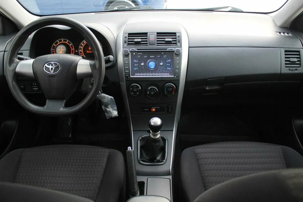штатные часы тойота королла 120. зима toyota corolla 2012 темно-синий. тойота королла 2012 салон. Toyota corolla 150 часы. настроить время тойота королла.