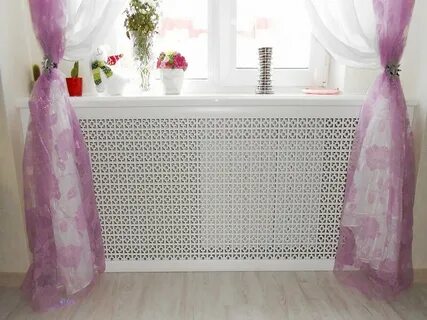 Шторы закрывают батареи