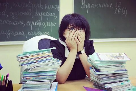 Учитель раздал ученикам тетради