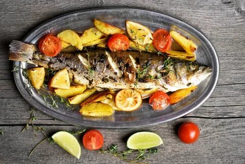 Сибас с овощами в духовке