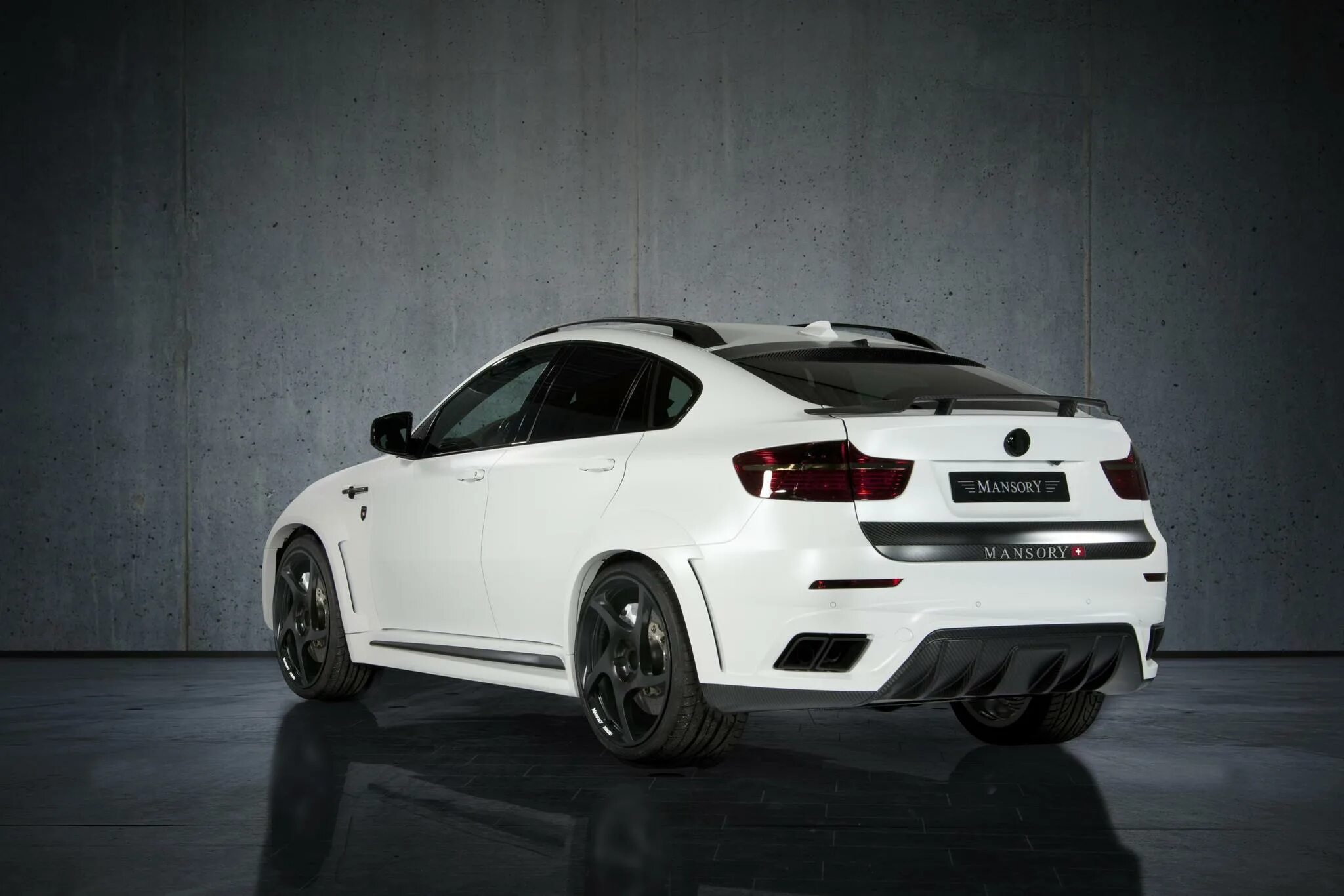 Ф7х тюнинг. BMW x6 Tuning белый. BMW x6m белый. BMW x6m Mansory. Mansory BMW x6 2022.