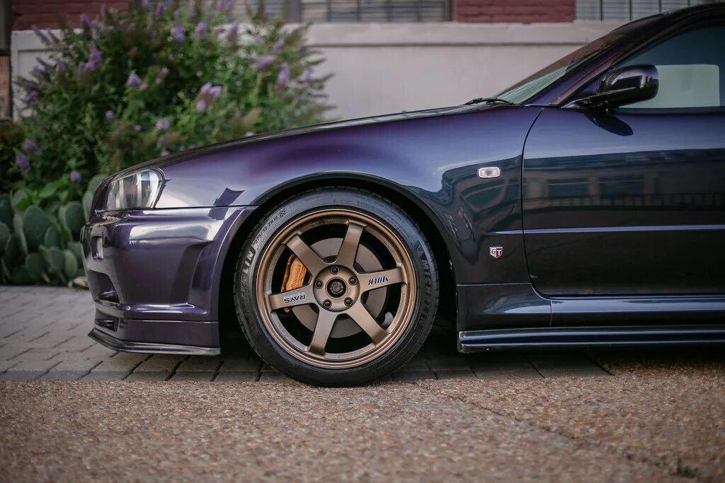 Special tuning. Skyline GTR r34 Midnight Purple. Nissan Skyline GTR r34 Midnight Purple. Rays te37 бронзовые на машине. Skyline 34 te37.