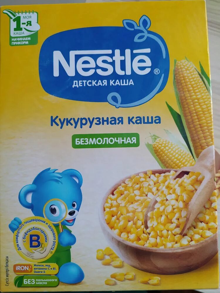 Детская каша нестле кукурузная безмолочная. Nestle кукурузная каша. Каша nestle большая железная банка. Каши нестле безмолочные ассортимент. Кукурузная каша молочная nestle.