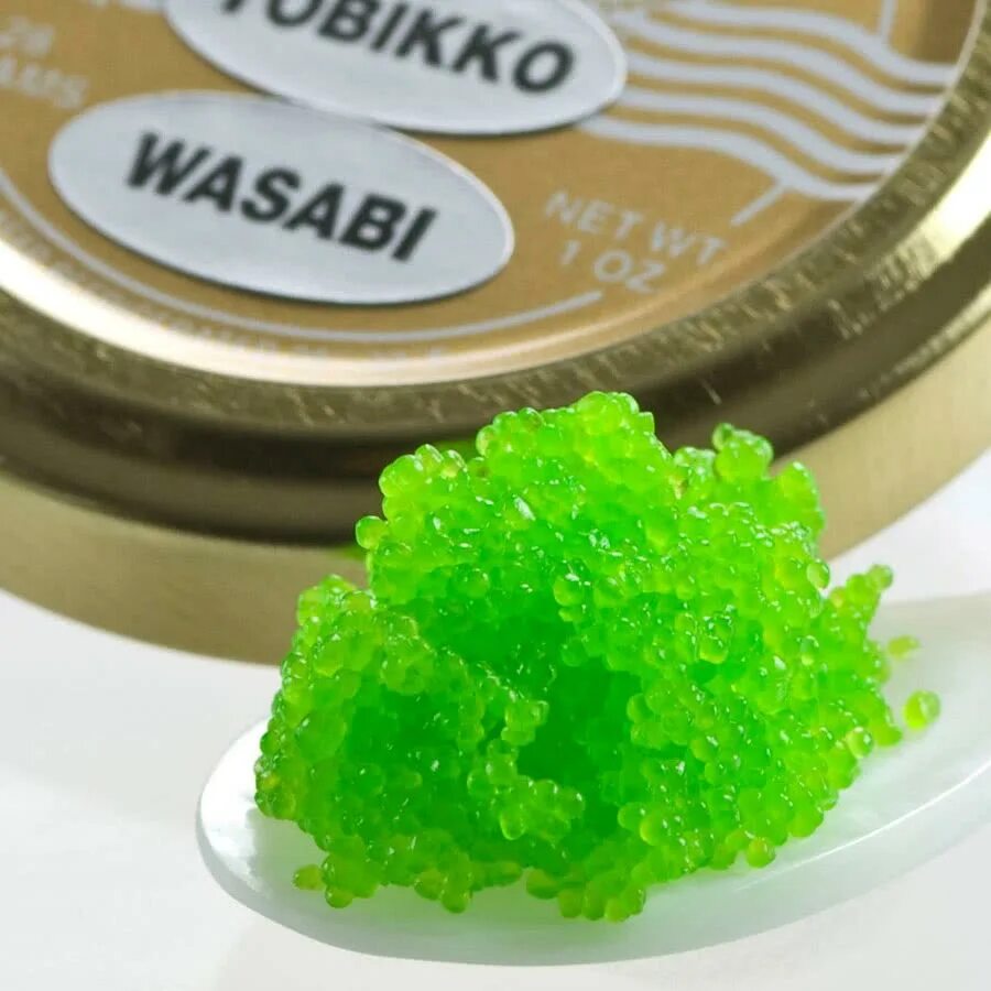 Рыба с зеленой икрой. Рыба с зеленой икрой. Икра тобико икра масаго. Зеленая икра. Зеленая икра тобико.