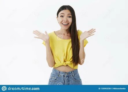 Delighted Sweet Asian Girl With Long Dark Hair In Cropped Yellow