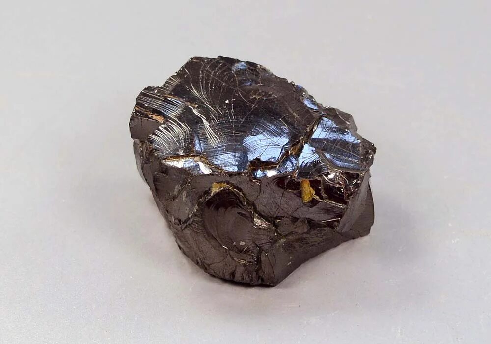 Какой камень добывают в карелии кроме шунгита. Шунгит камень. Карельский шунгит. Шунгит черный минерал. Аспид камень шунгит.
