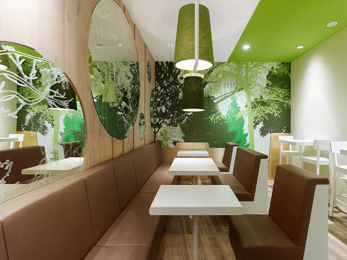 Greener кафе. Экостиль в кафе. Интерьер ресторана в эко стиле. Экостиль в интерьере. Интерьер кафе в зеленых тонах.
