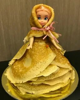 Забавная мода навеянная Масленицей: куклы Барби в блинных платьях