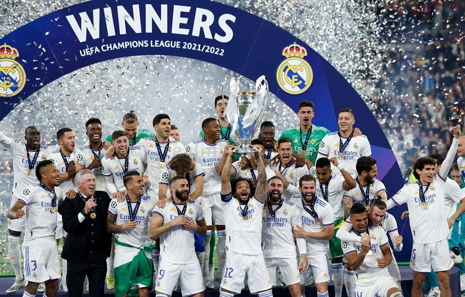 Real madrid champions. Реал Мадрид чемпион 2022. Реал Мадрид победа в Лиге чемпионов 2022. Реал Мадрид победитель Лиги чемпионов 2022. Реал Мадрид лига чемпионов 2022.