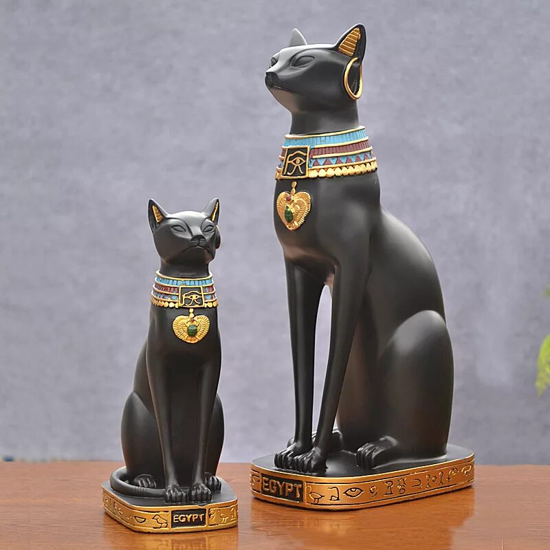 Купить египетскую кошку. Статуя кота в Египте. Египетская кошка статуя. Египетская МАУ статуэтка. Бастет богиня.