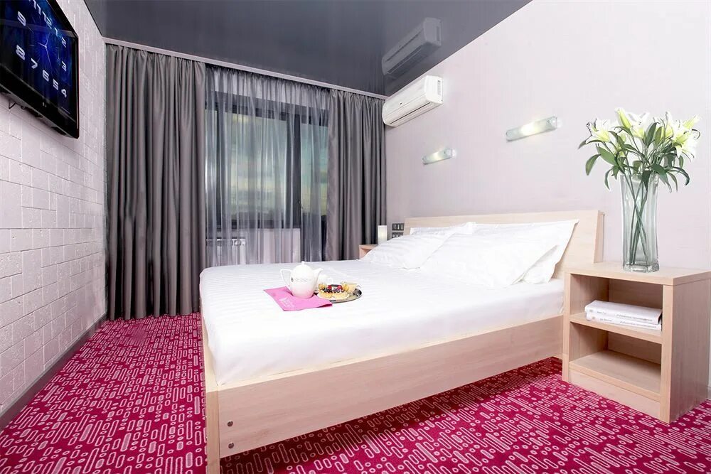 Стандарт "Улучшенный" с большой кроватью - Picture of Marins Park Hotel Nizhny N