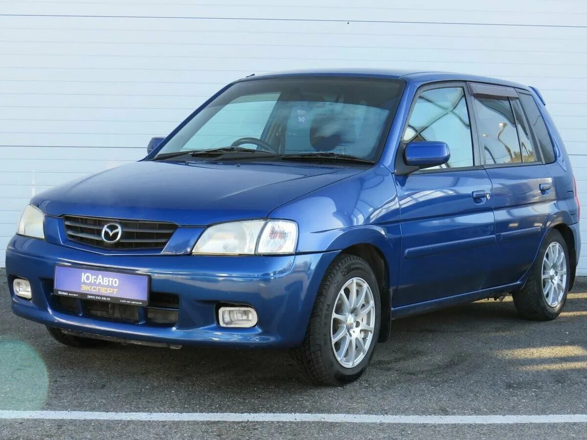 Мазда демио 2001 купить. Мазда Демио 2001. Mazda Demio DW 2001. Мазда Демио 2001 синяя. Mazda Demio 2001 фиолетовый.