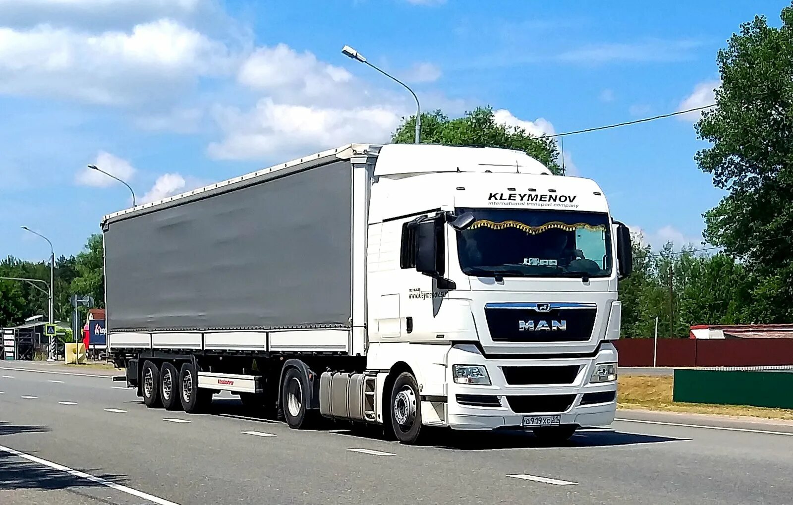 Man 24. Ман тгх с полуприцепом крона. man tgx в россии. фура ман. фура ман тга белый.