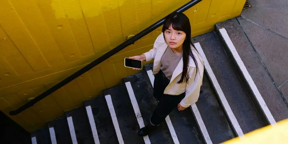Asian Woman Falling Down of Staircase and Having Injured at Home Stock Image - I