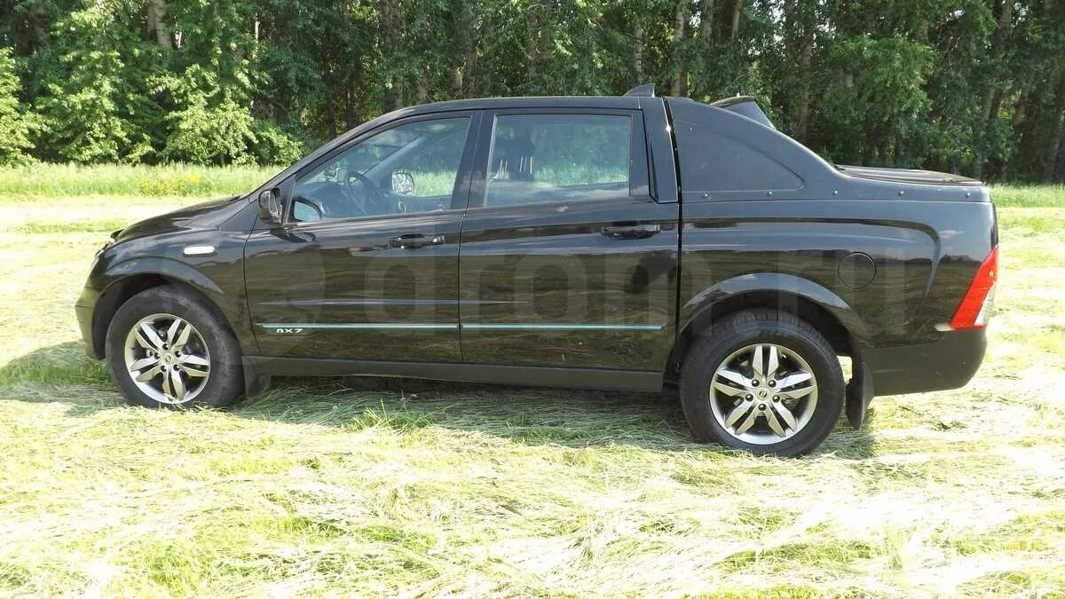 Черный саньенг Актион спорт 2. SSANGYONG Actyon Sports черный. SSANGYONG Actyon Sports i 2006-12. Ssang Yong Actyon Sport 35 колеса. Саньенг актион 2 бензин