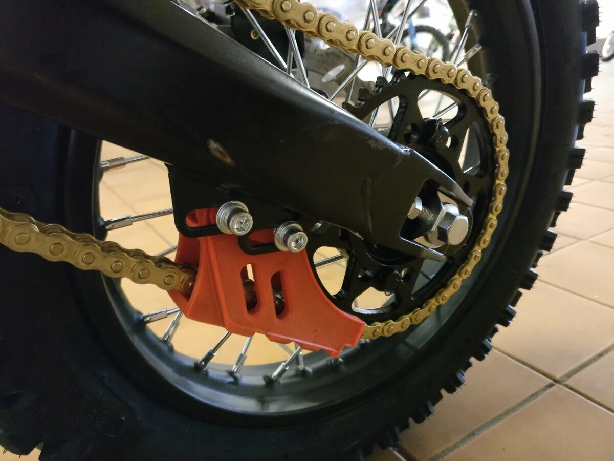 ролик цепи на питбайк 125. натяжитель цепи питбайк 125 мотоленд. какая цепь на питбайке. цепь на питбайк 125. натяжка цепи питбайк 125.