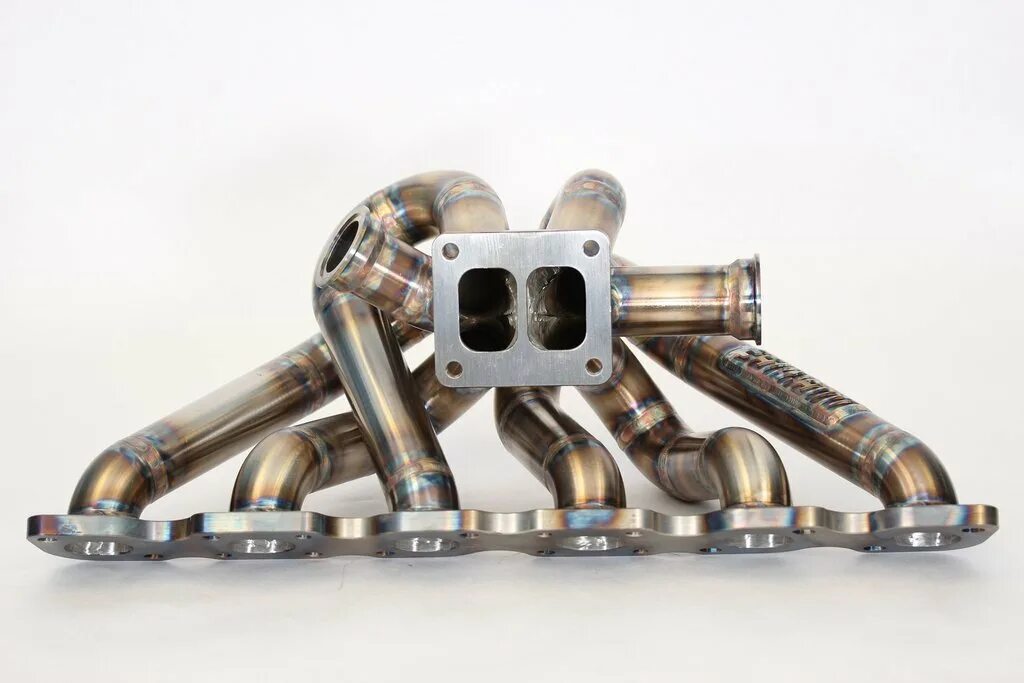 Выпускной коллектор vg30dett. Rb26dett сингл. Впускной коллектор vr38dett. Vr38 Exhaust Manifold. Manifold перевод