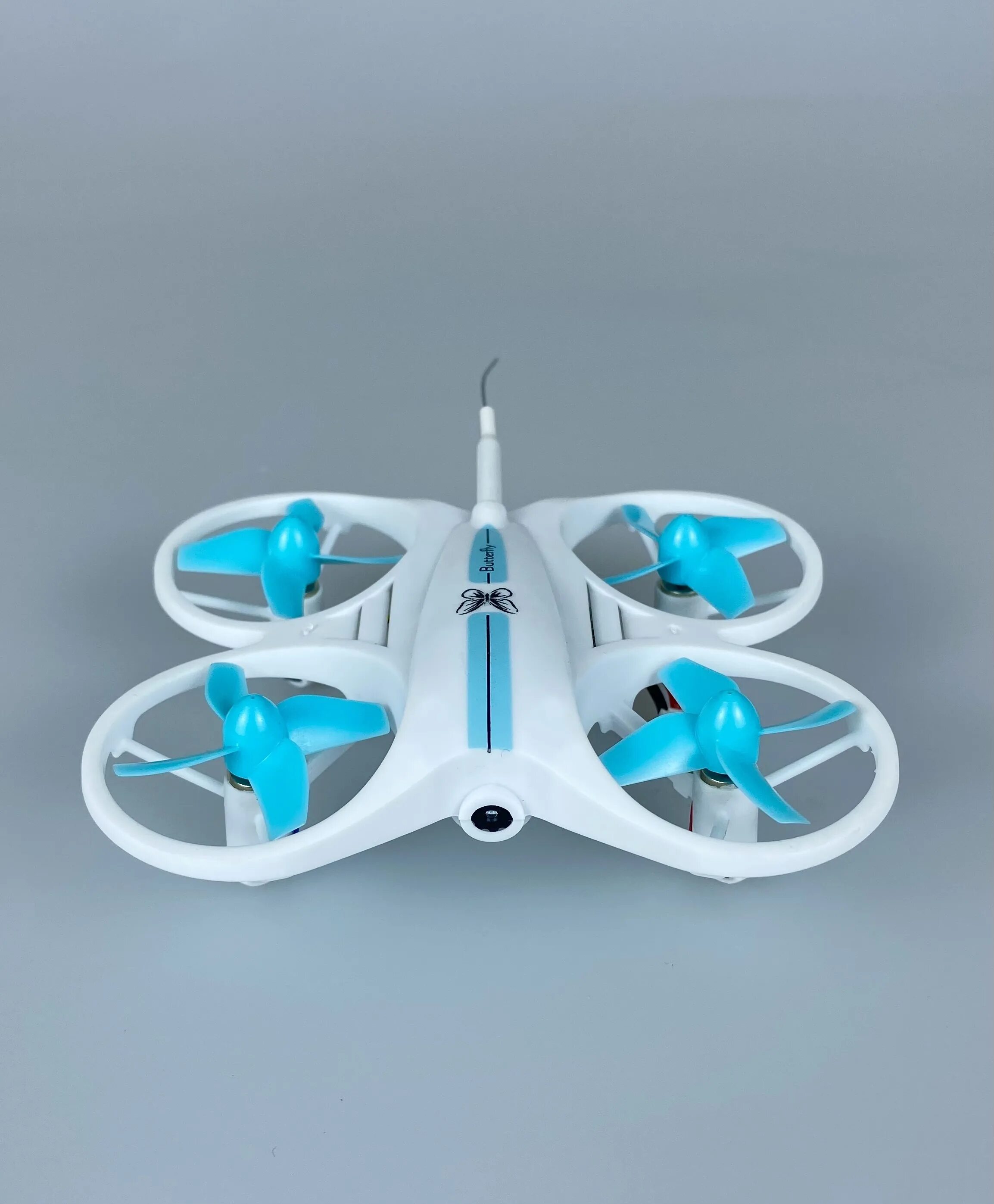 Наклейки на пульт. Баттерфляй квадрокоптер с камерой. Бабочка на пульте управления игрушка. Дрон бабочка. Квадрокоптер бабочка.