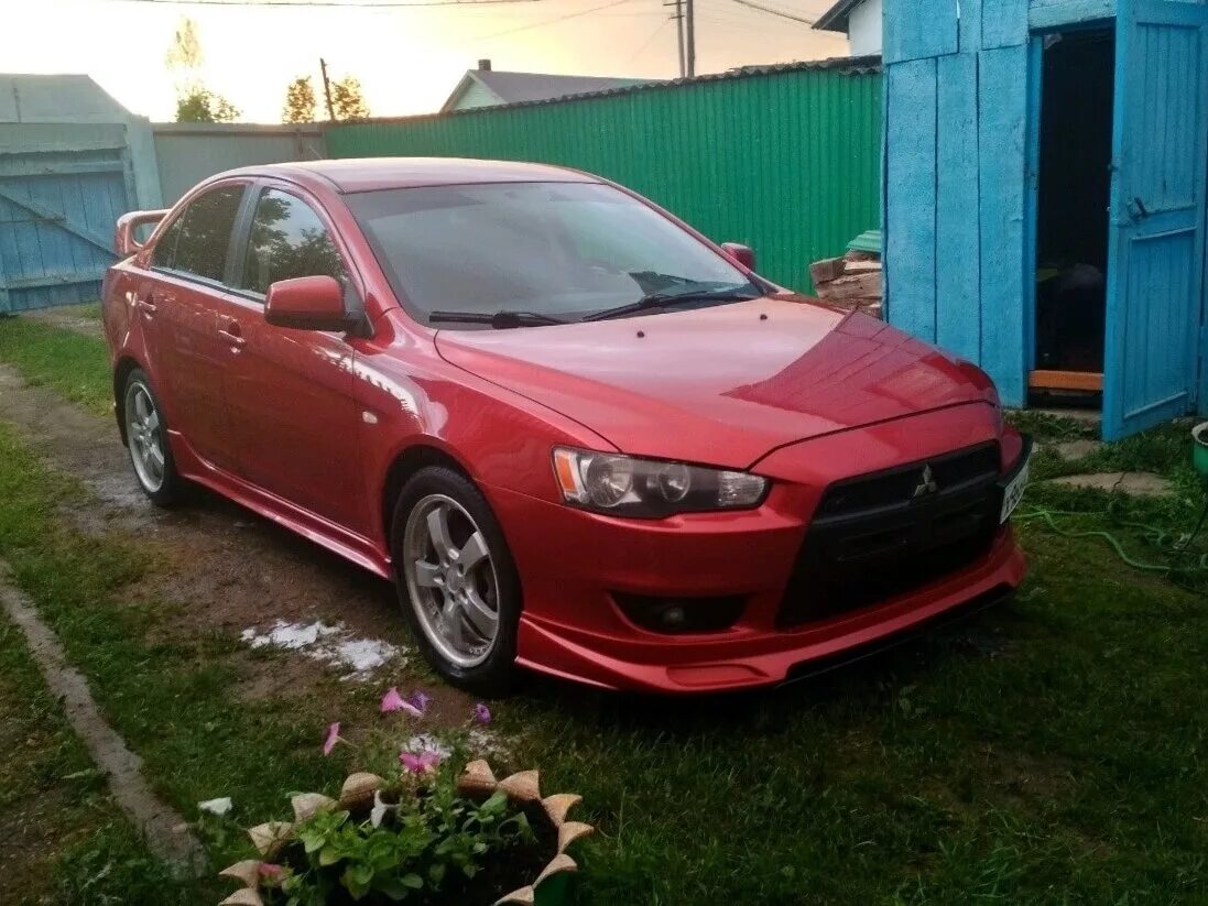 Лансер 10 купить б у. Mitsubishi Lancer красный 2007. Митсубиси Лансер красный 2007. Мицубиси Лансер x 2007. Лансер 10 2007 2.0.