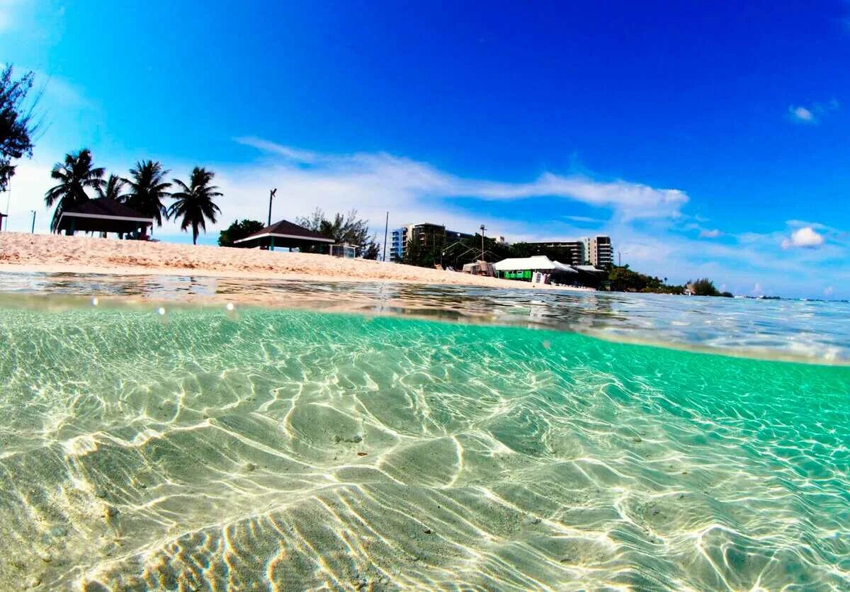 Seven Mile Beach острова Кайман. Большой Кайман Каймановы острова. Остров Grand Cayman. Каймановы острова пляжи.