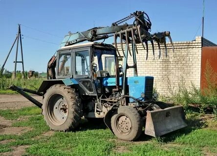 Грейферный погрузчик