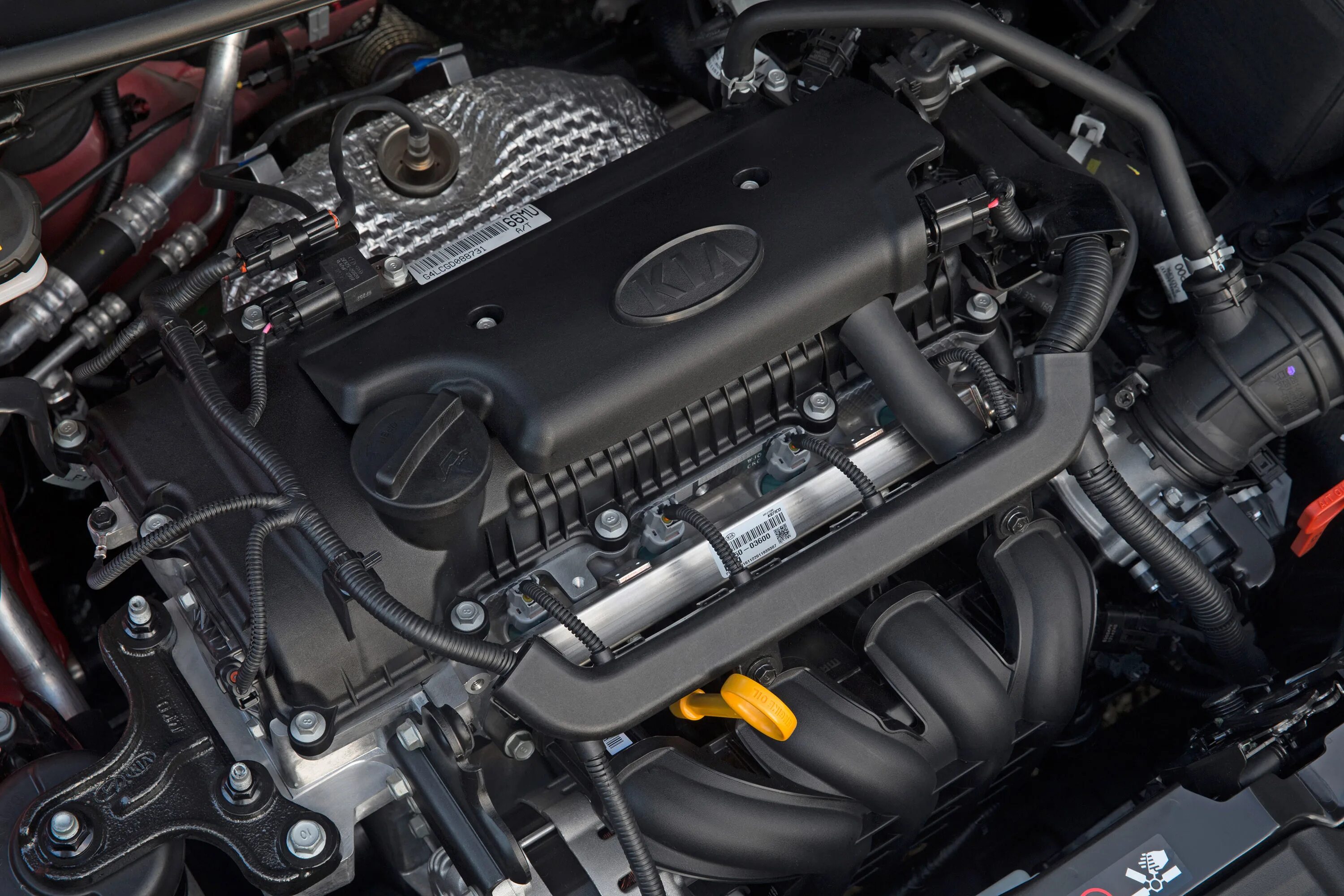 Моторное 2017. Киа рио 2017 моторный отсек. kia rio 2018 моторный отсек. кия рио моторный отсек. киа рио 2017 подкапотное.