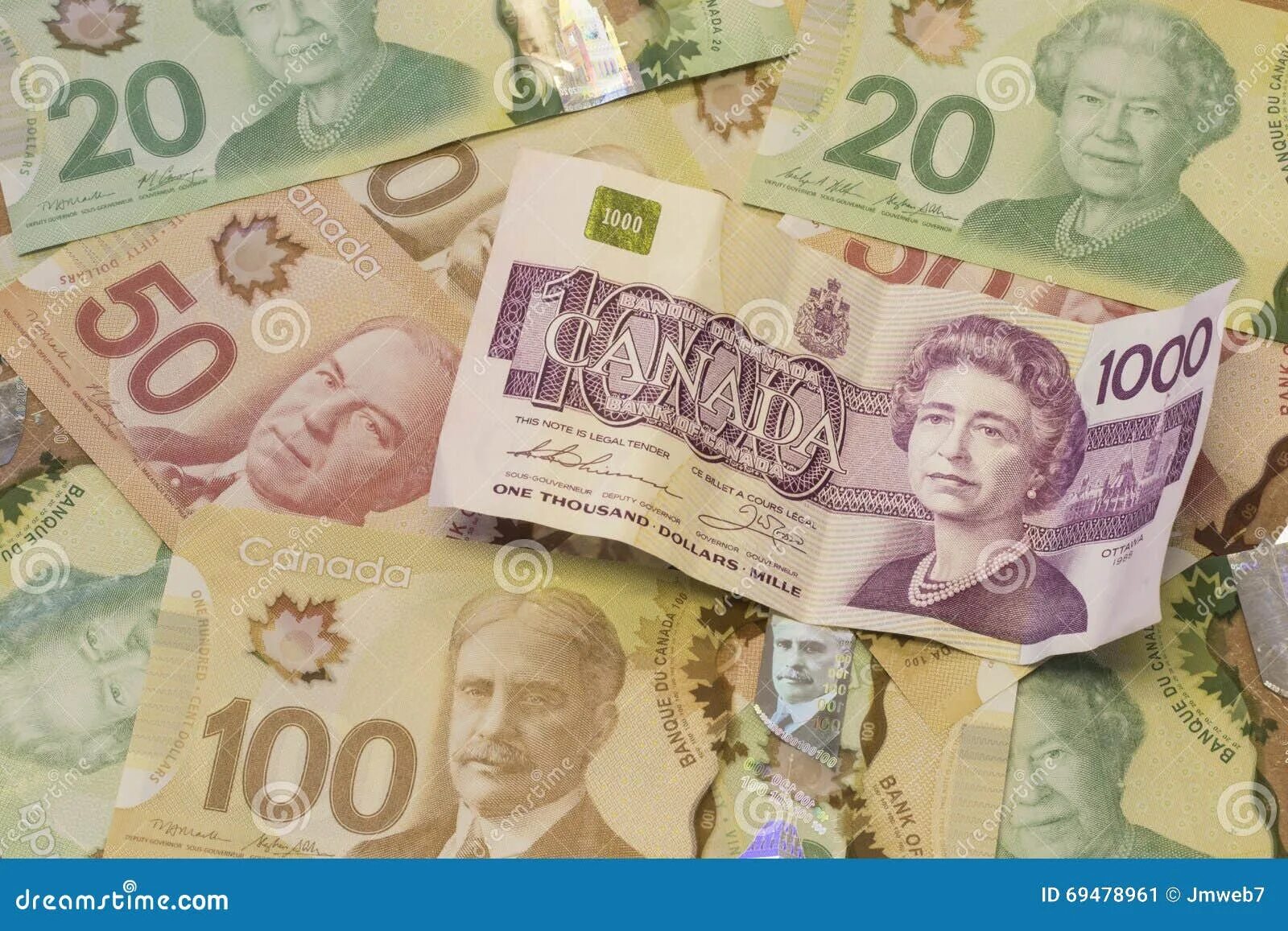 Валюта канадский доллар. 100 Канадских долларов. Канадская валюта без фона. Канадский доллар в тенге