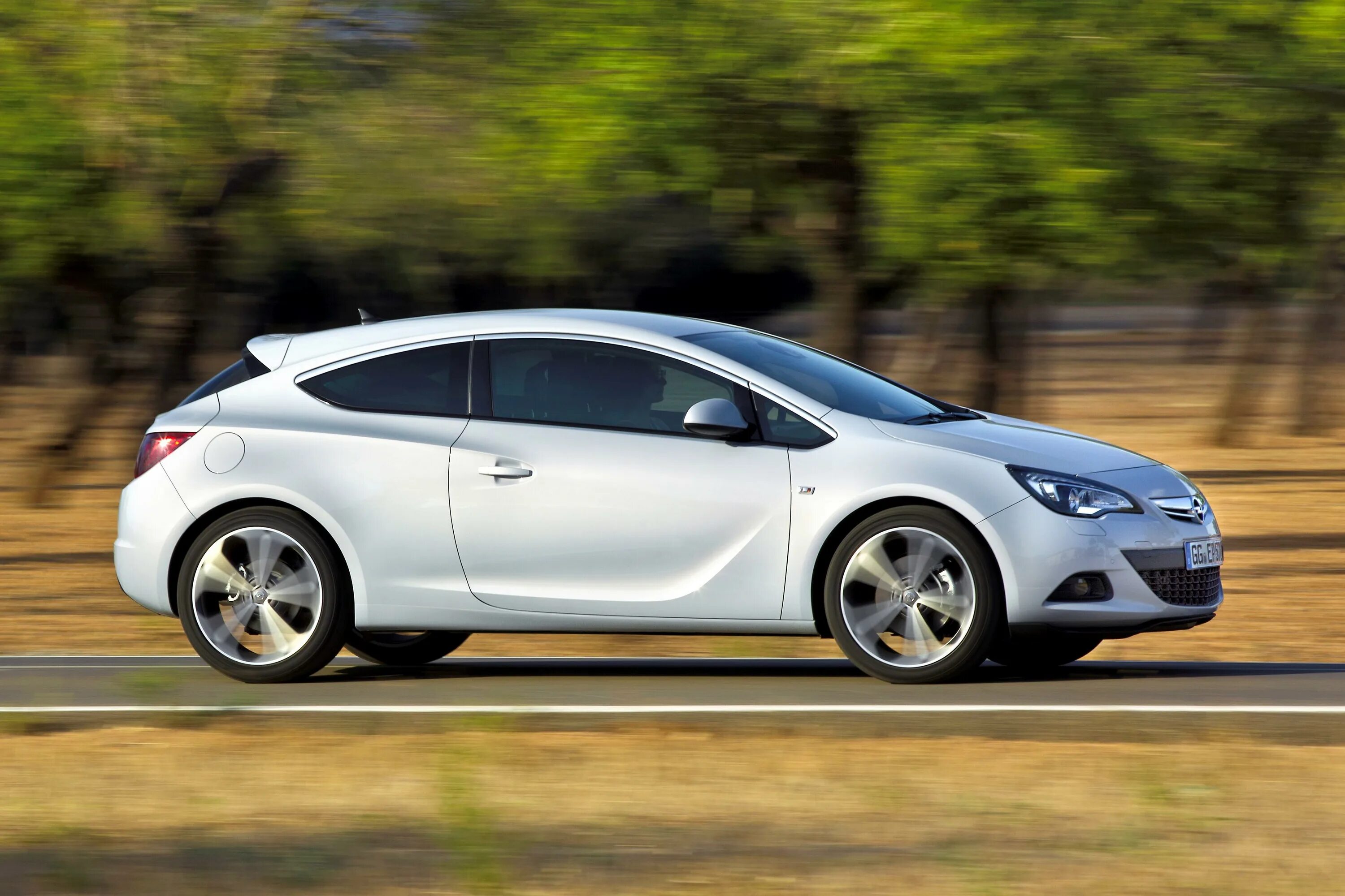 Опель gtc хэтчбек. Opel astra gtc 2011. opel astra gtc хэтчбек. opel astra j gtc.