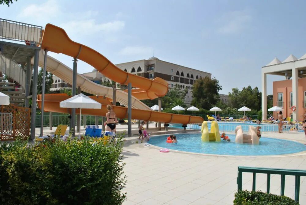 Wasa holiday village 4 отзывы. Kaya Belek горки. Кая Белек сад. Kaya Belek пляж. Кая Белек бассейн.