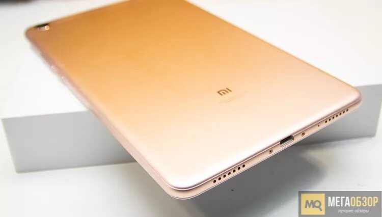 Xiaomi золотистый. Xiaomi MIPAD 4 64 ГБ LTE. Планшет Сяоми 2015 Старая модель.