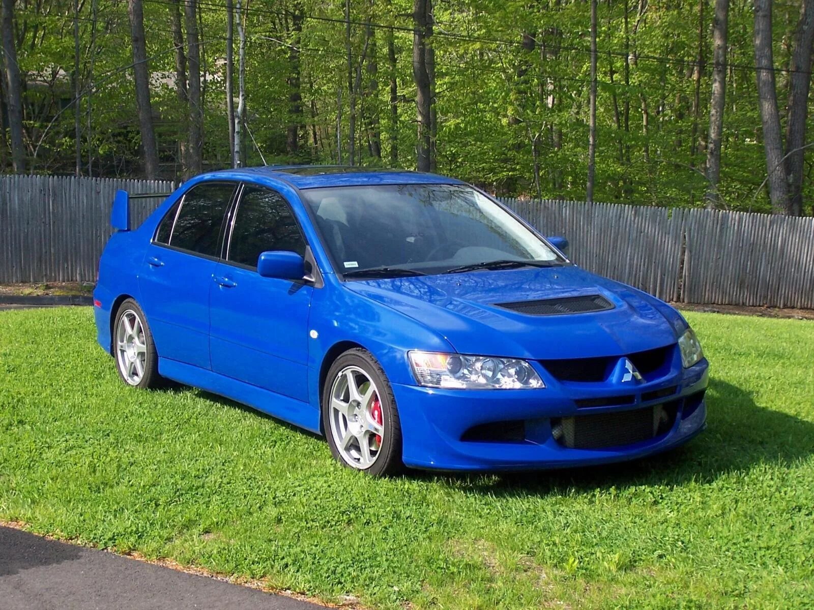 Mitsubishi evo 8. Митсубиси Лансер Эволюшн. Митсубиси Лансер 8. Mitsubishi Lancer EVO 8 Blue. Мицубиси Лансер Эволюшн 9.