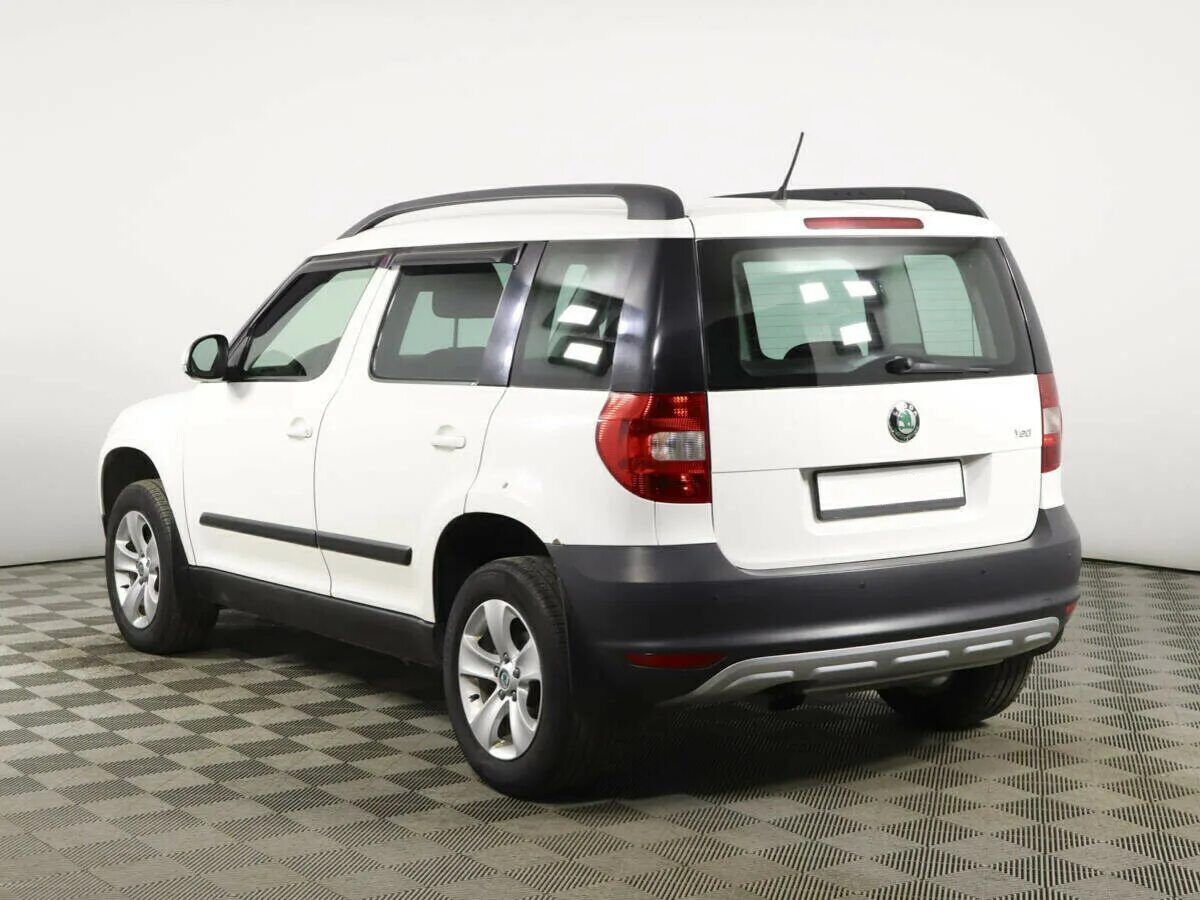 Шкода йети 2012 год. Skoda Yeti 2012. Skoda Yeti 1.2. Шкода Йети 1.2 2012. Skoda Yeti 2012 back.