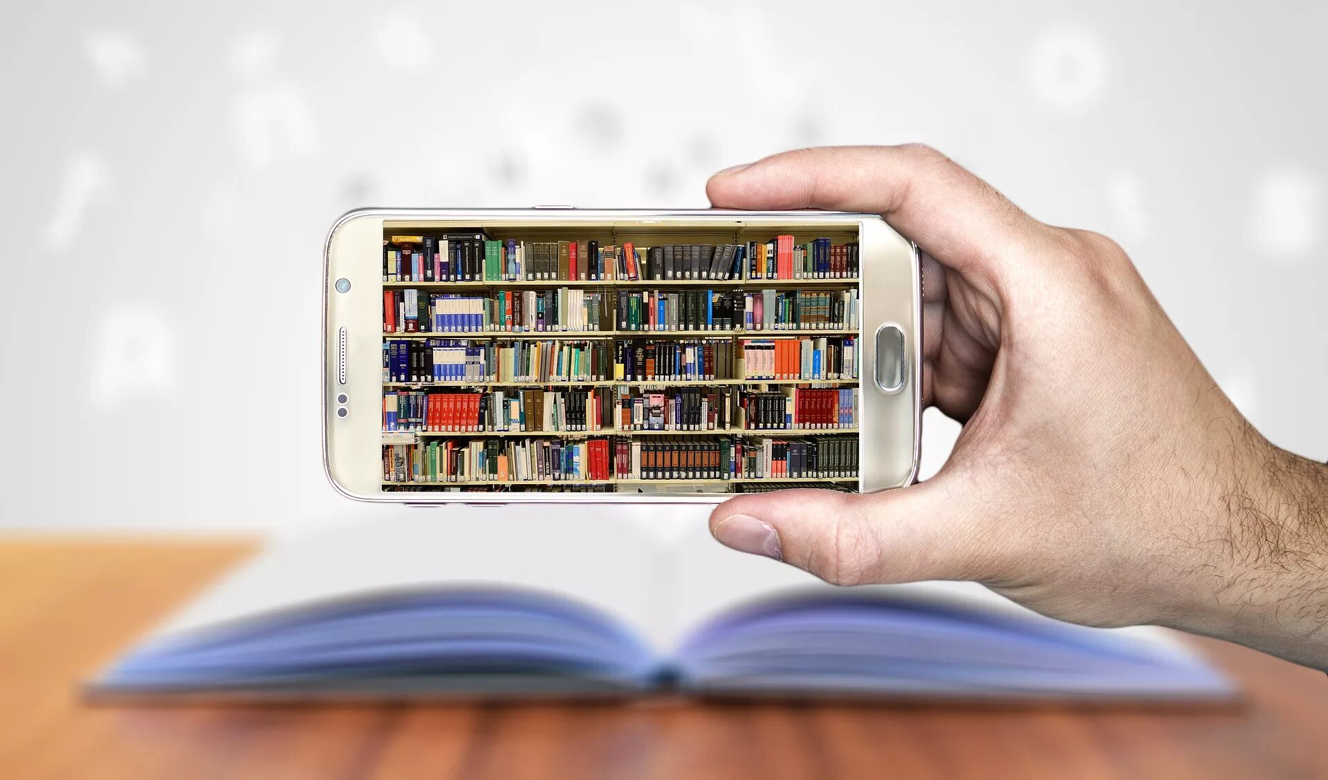 Телефон библиотеки. Цифровая библиотека. Библиотека в телефоне. Книга в смартфоне. Книга телефон.