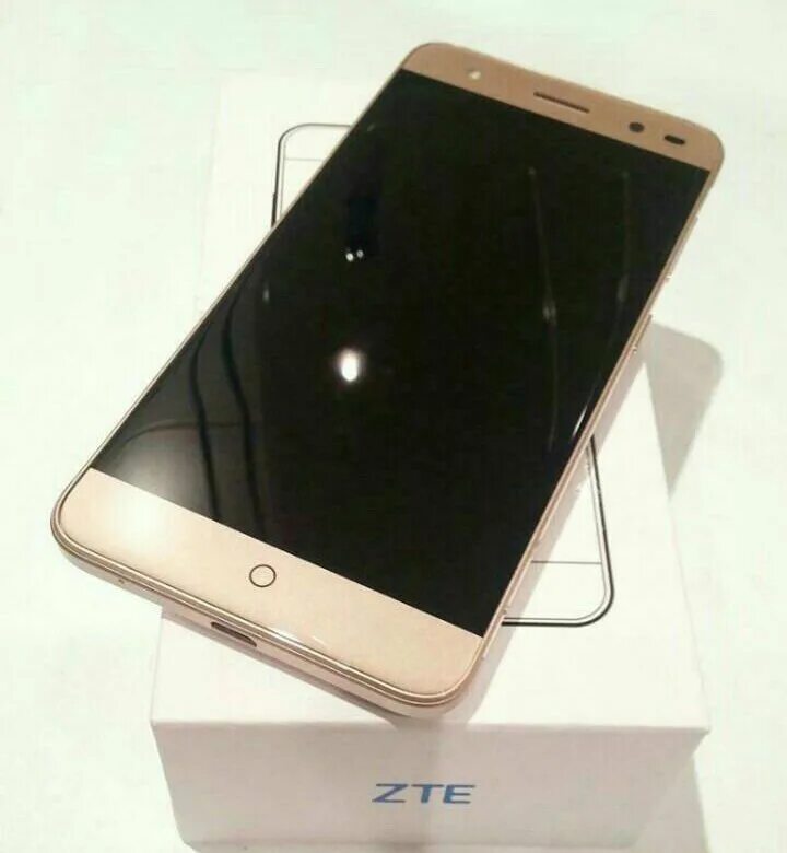 ZTE v7 Lite. ZTE золотой корпус. ZTE прямоугольный.