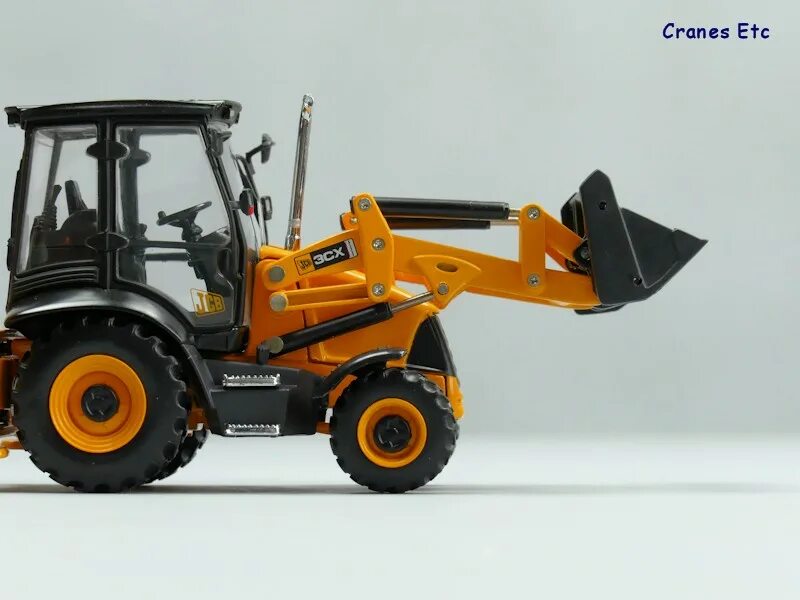 Модели jcb. Motorart 1:50 jcb 3cx. масштабная модель экскаватора погрузчика jcb 3cx 1/50. модель экскаватор jcb 3cx. jcb игрушка экскаватор-погрузчик 1:50.