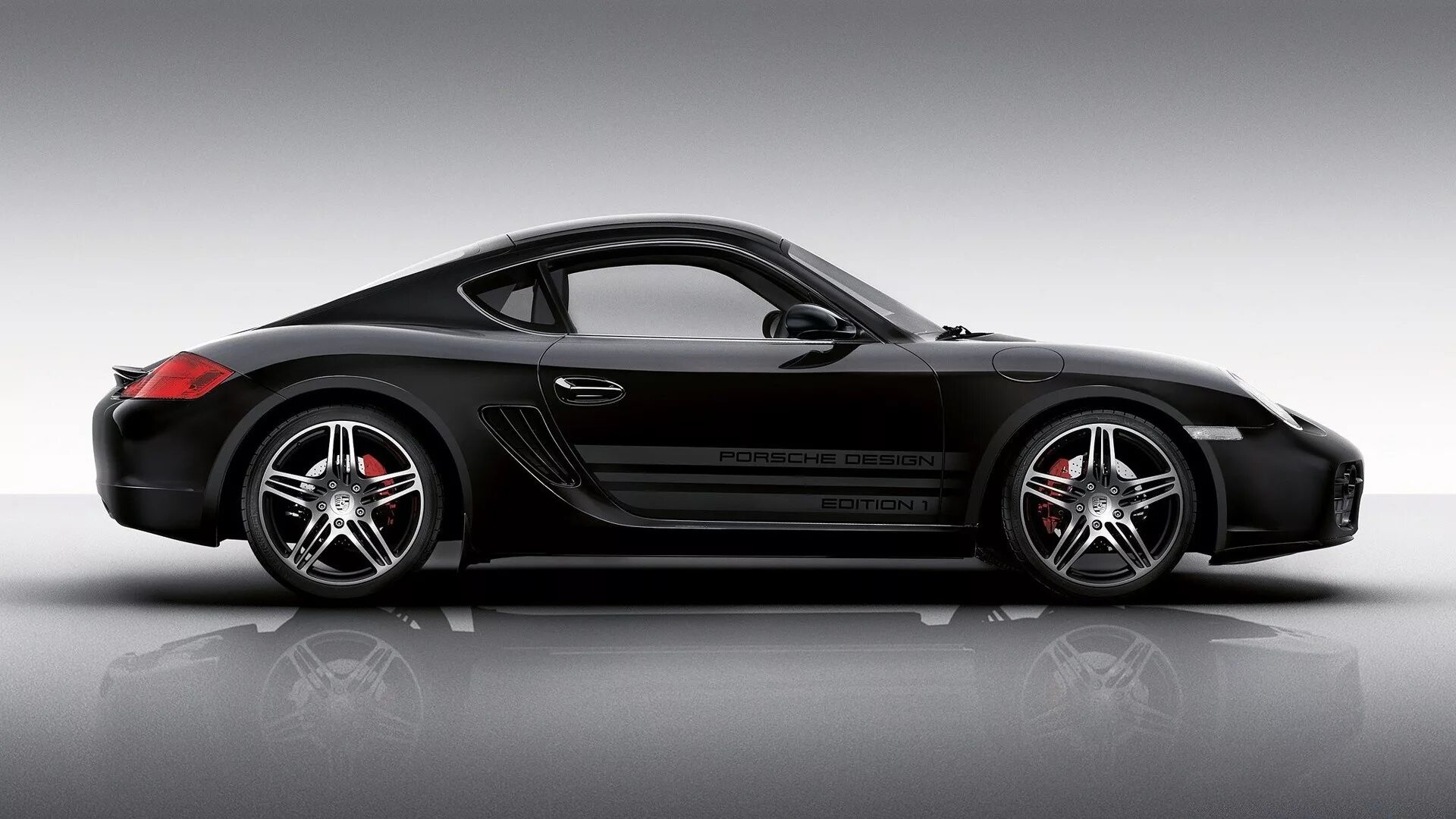 Порше сбоку. Cayman s porsche design edition 1. porsche блэк эдишн. porsche design машина. порше design.