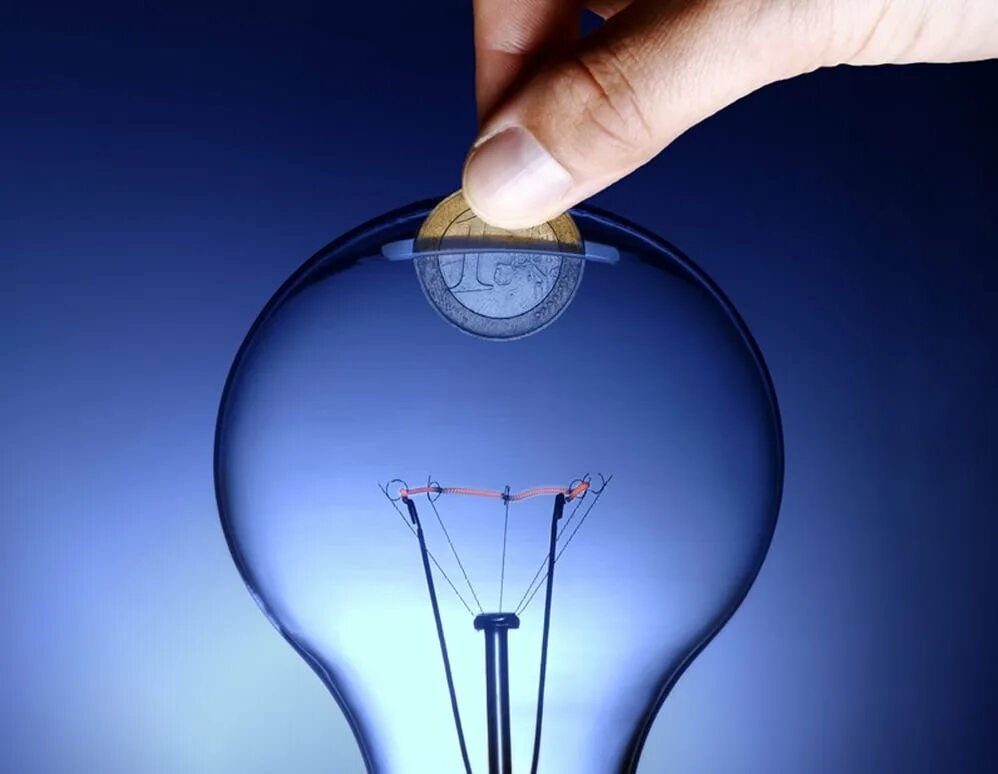 Экономия электроэнергии. Идея экономии. Энергоэффективность фон. Деньги внутри лампочки. Экономия электроэнергии.