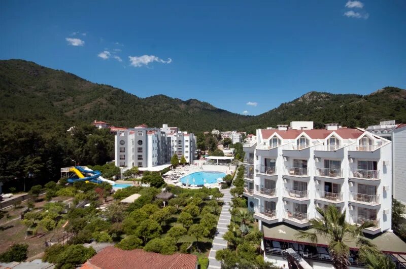 Caprice beach ex luna beach. Луна бич делюкс мармарис. Caprice beach ex luna beach. Отель luna beach deluxe hotel. Caprice beach hotel 5 турция мармарис.