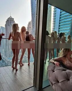 The second image shows nine nude women standing on a balcony in Dubai, Unit...