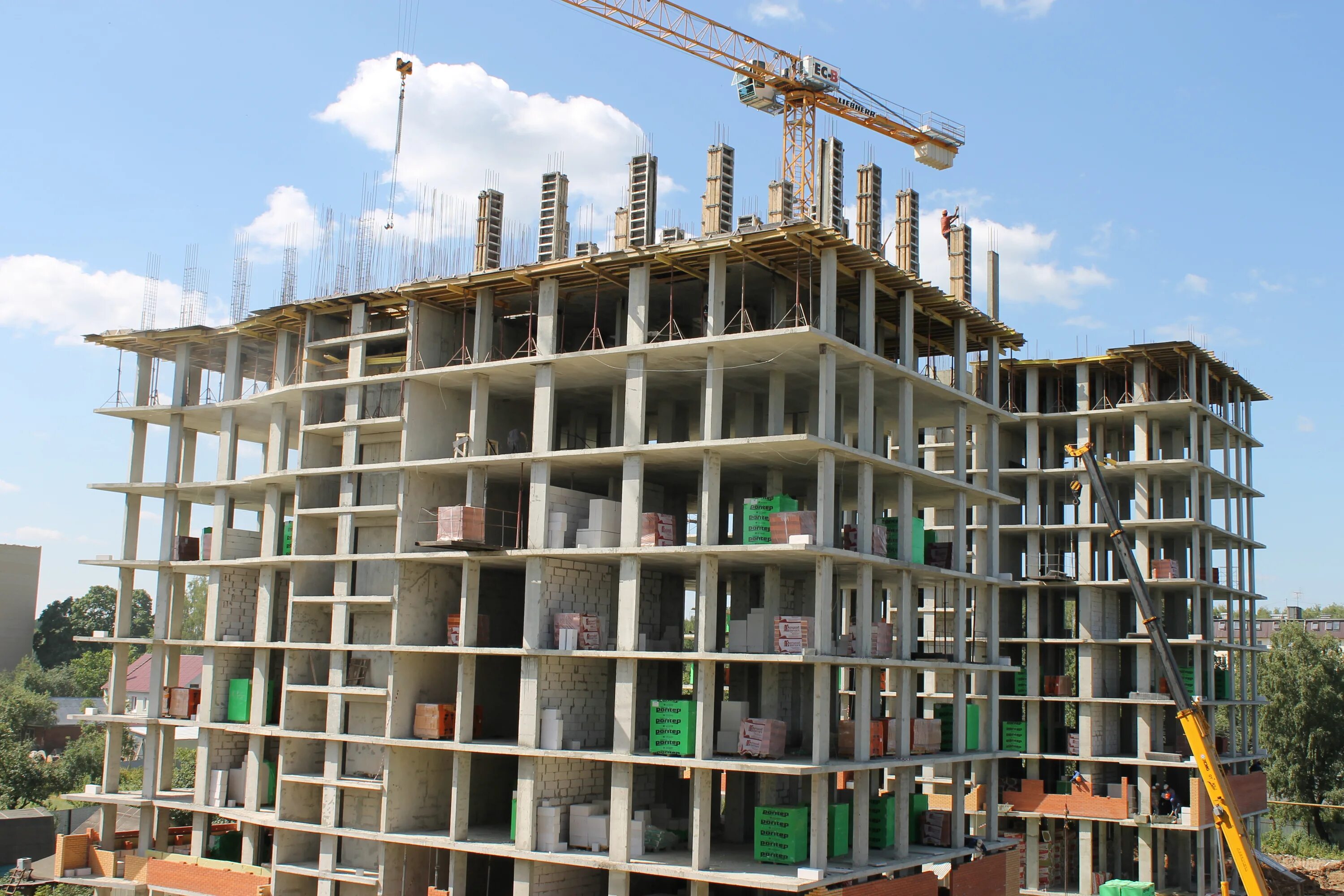 Каркасное здание. Многоэтажное деревянное домостроение. Стальной каркас многоэтажного здания. Лстк технология строительства. Многоэтажный стальной каркас.