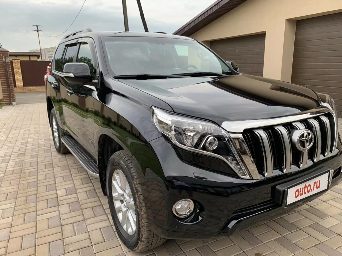 прадо 150 2014 рестайлинг. Toyota land cruiser prado 150 черный. тойота прадо 150 рестайлинг. реклама прадо. Toyota prado 2014.