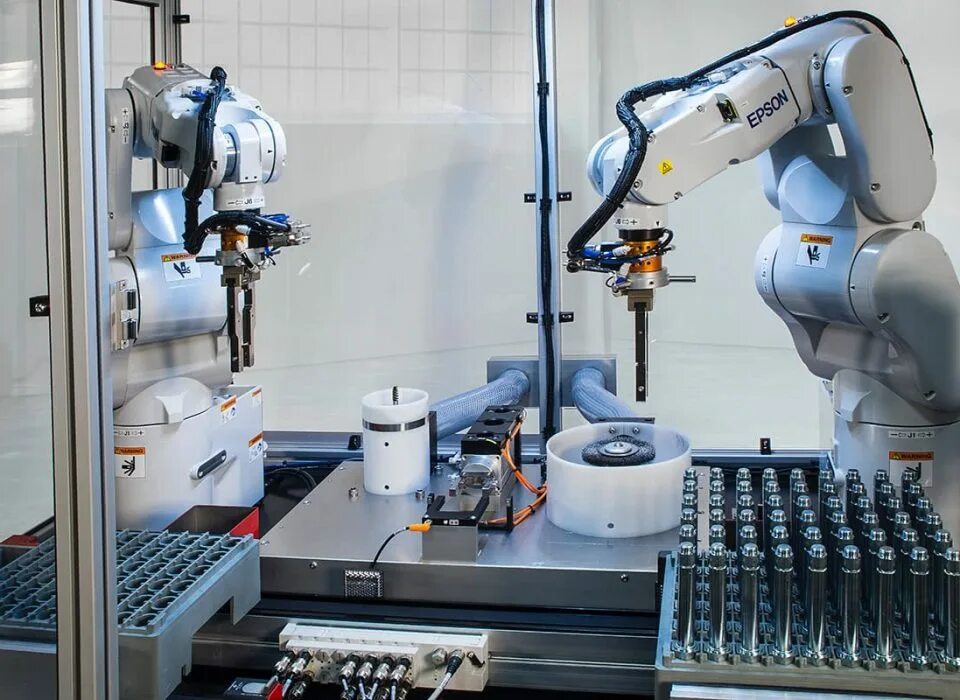 Пневматический робот. Автоматизация и робототехника. Прецизионный робот. Промышленный робот Kawasaki на рельсе.