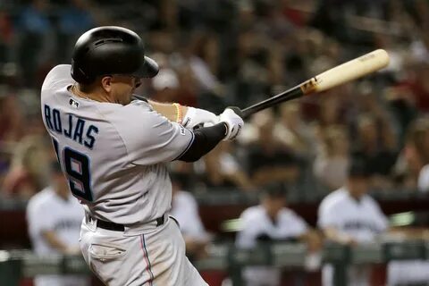 Rojas has 6 RBIs, Marlins power past D-backs 12-6.